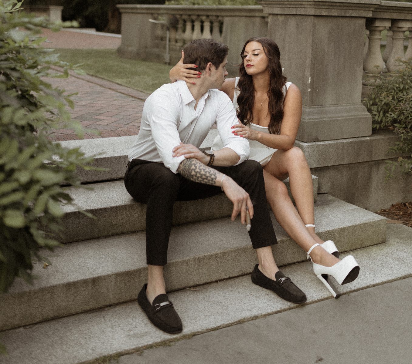 Alyssa and Giovanni on garden steps